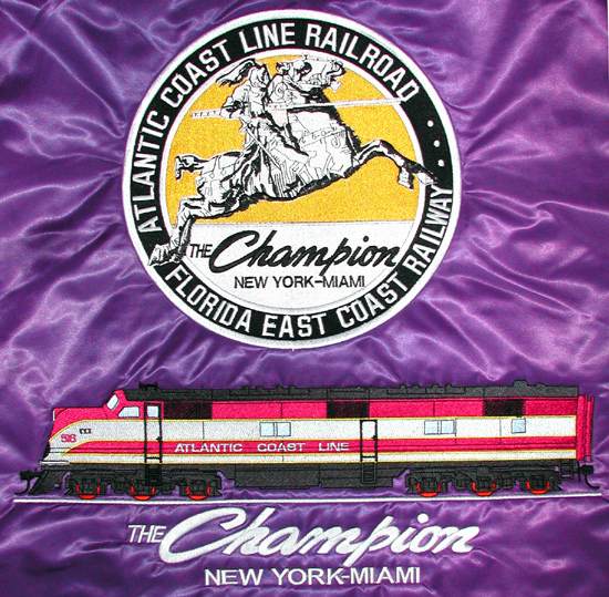 The Champion Circle Logo with EMD E-6 in Purple