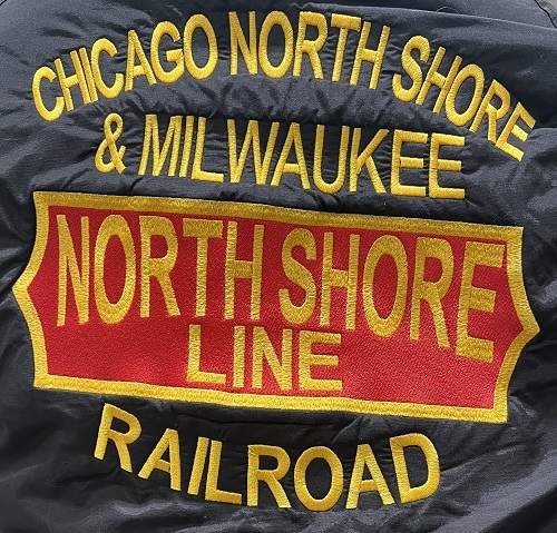 Nouth Shore with lettering around Logo